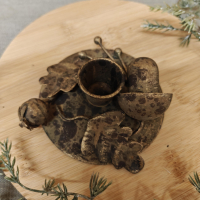 kandelaar met bladeren